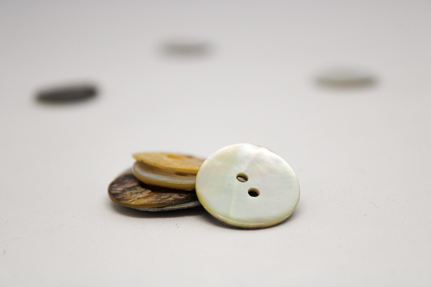 PEARL BUTTON
